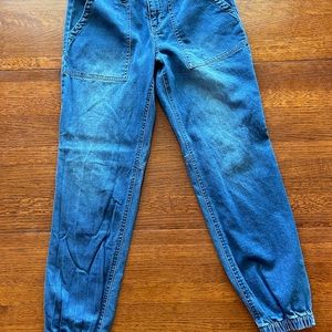 Peace, Love, World jogger jeans